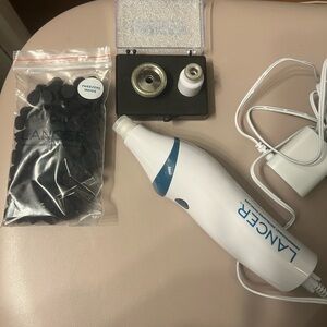 Lancer microdermabrasion tool